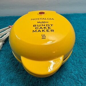 Nostalgia MyMini Bundt Cake Maker Yellow Compact Electric Baker Non-Stick 3-Slot